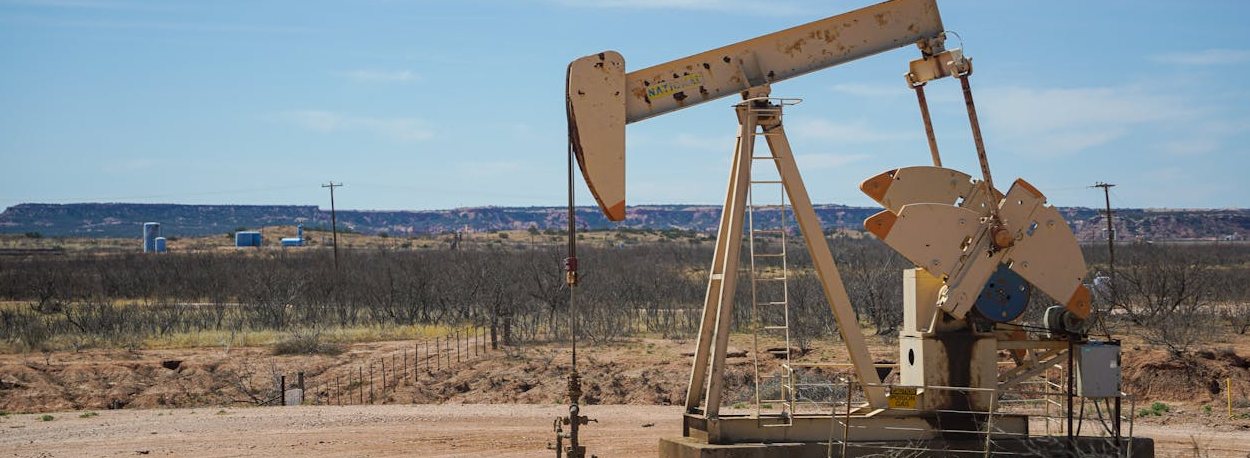 Oil pumpjack at work in the desert